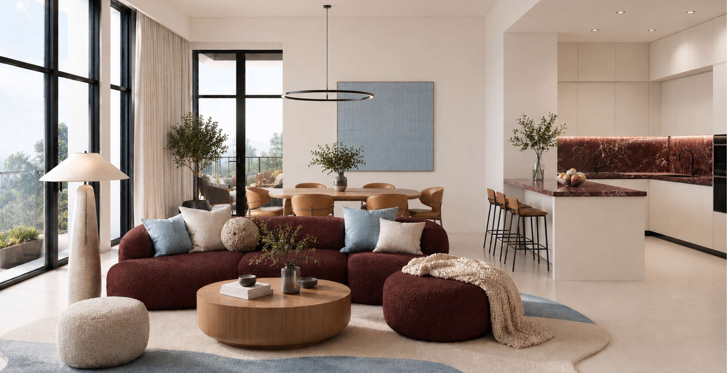 Living and dining room with burgundy sofas
